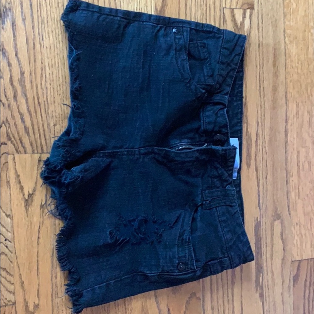 Distressed black jean shorts